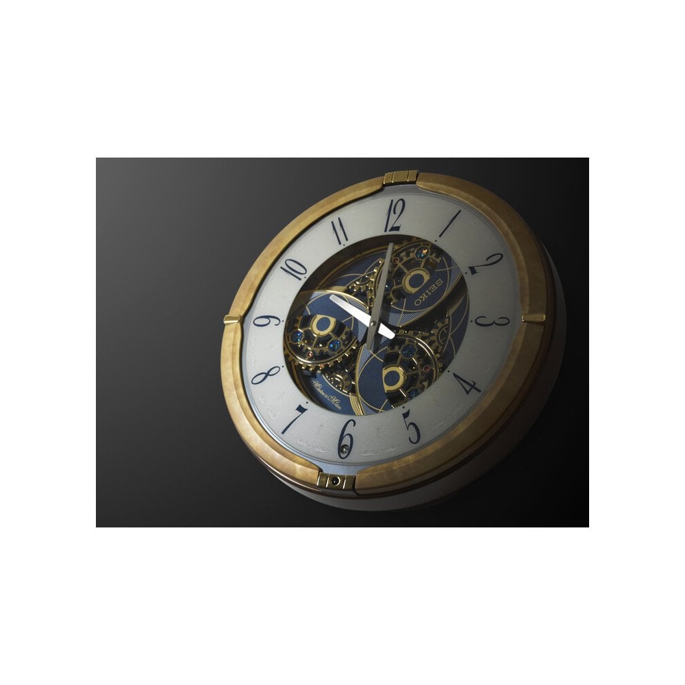 Melody in Motion Musical Quartz Wall Clock QXM387G
