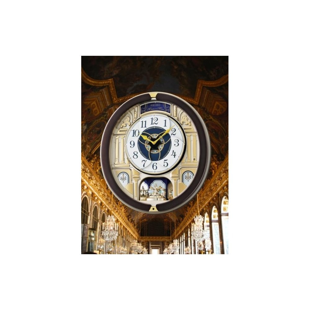 Melodies in Motion Musical Quartz Wall Clock QXM356B