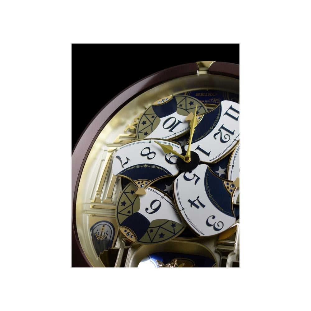 Melodies in Motion Musical Quartz Wall Clock QXM356B