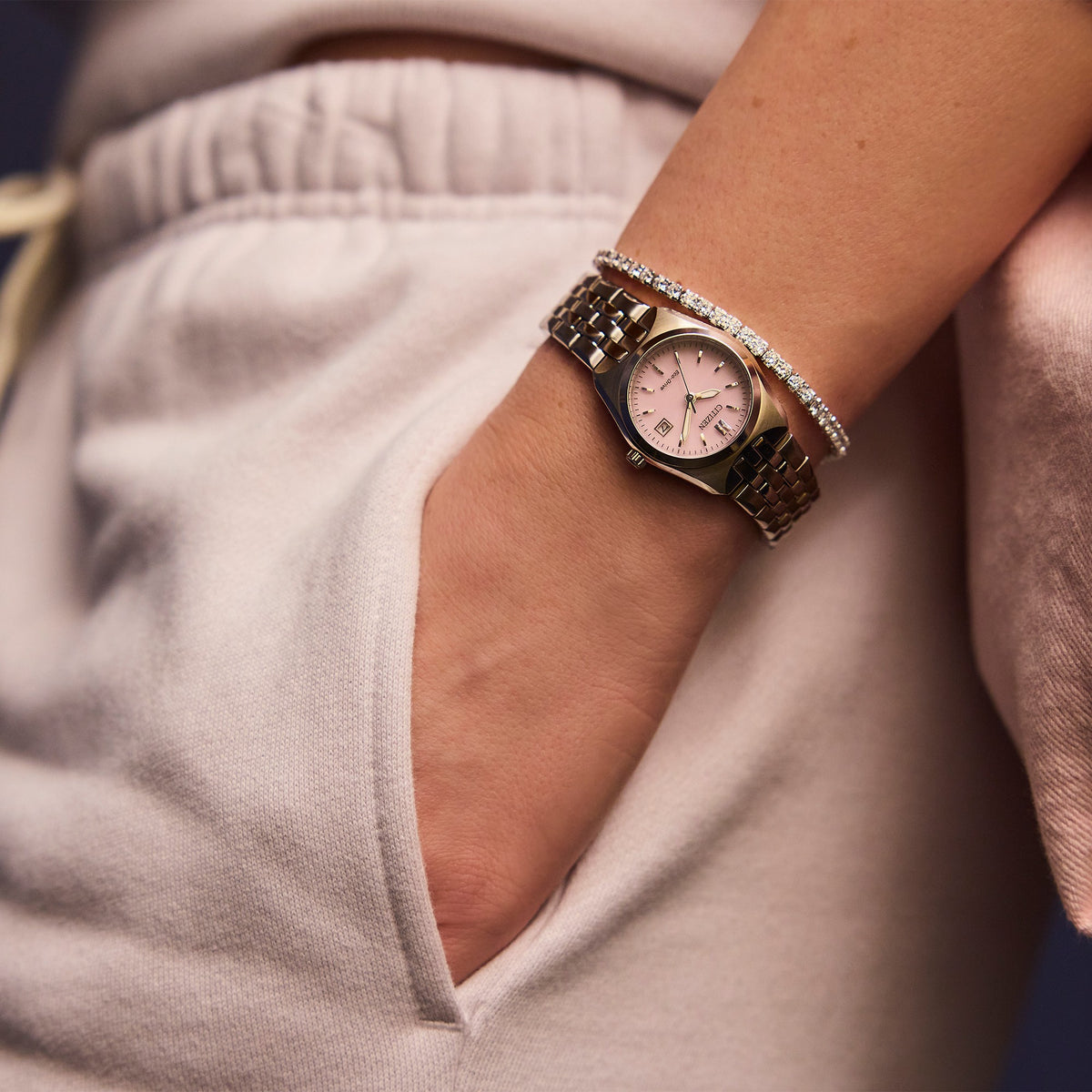 EW2291-51X Citizen Eco-Drive Stainless Steel Ladies Solar Powered Watch on Bracelet with Pink Dial and Date Corso Wrist